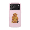 Pumpkin iPhone case by Loevas – a teddy bear in a pumpkin costume on pink, back view