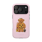 Pumpkin iPhone case by Loevas – a teddy bear in a pumpkin costume on pink, back view
